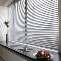 Aluminium blinds above a kitchen counter in a Cape Town home