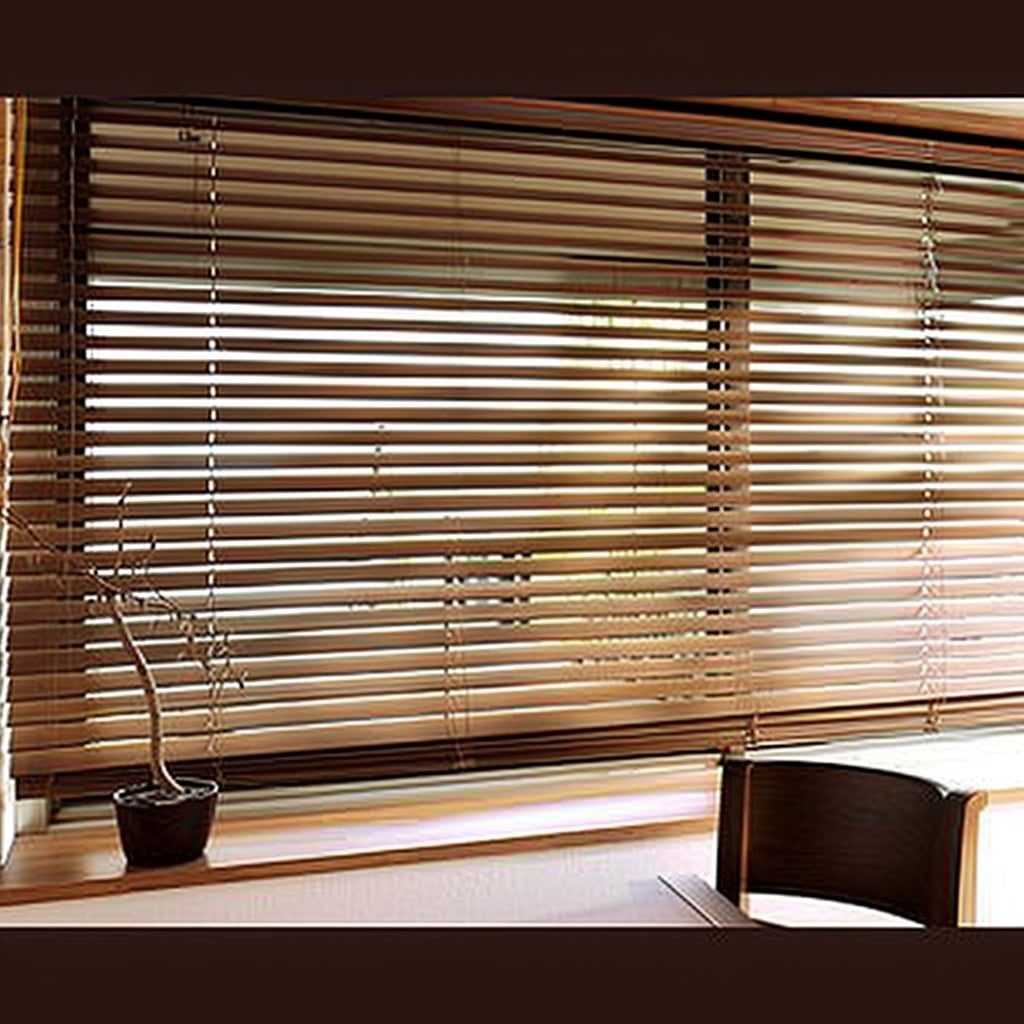 Woven bamboo roll-up blind partly raised above a window