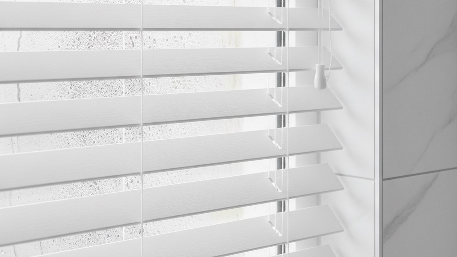 White faux-wood venetian blind closed over a Cape Town bathroom window with condensation on the glass
